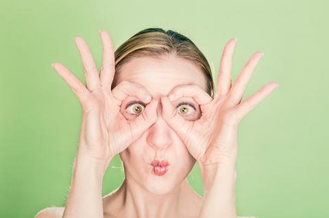 Woman with eyes wide open